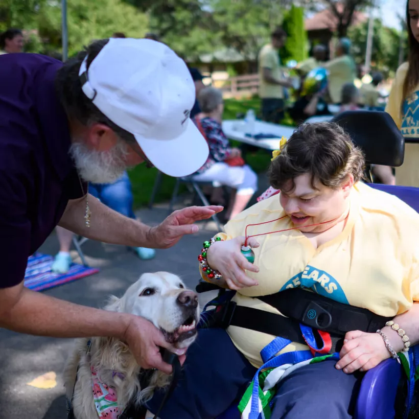 A Group of People with a Dog