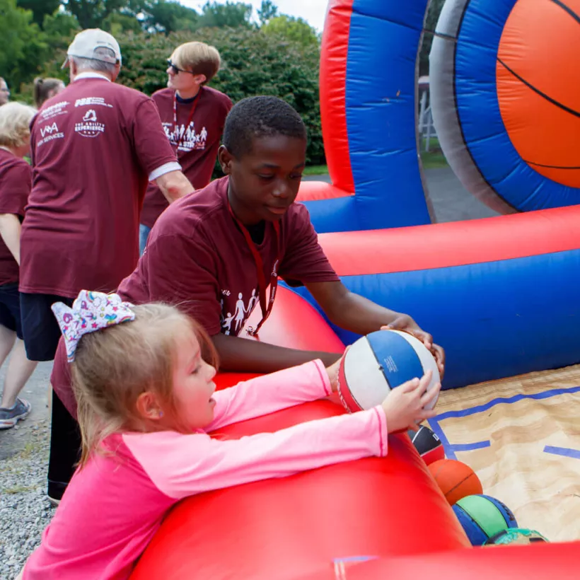 Two Children Playing Basketball