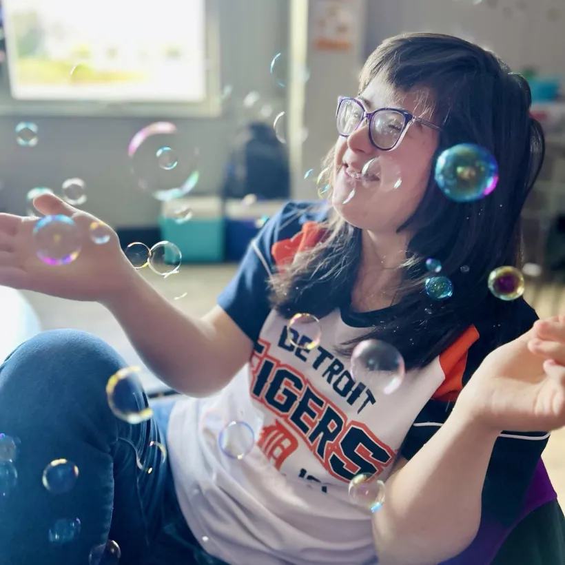 Person Smiling with Bubbles